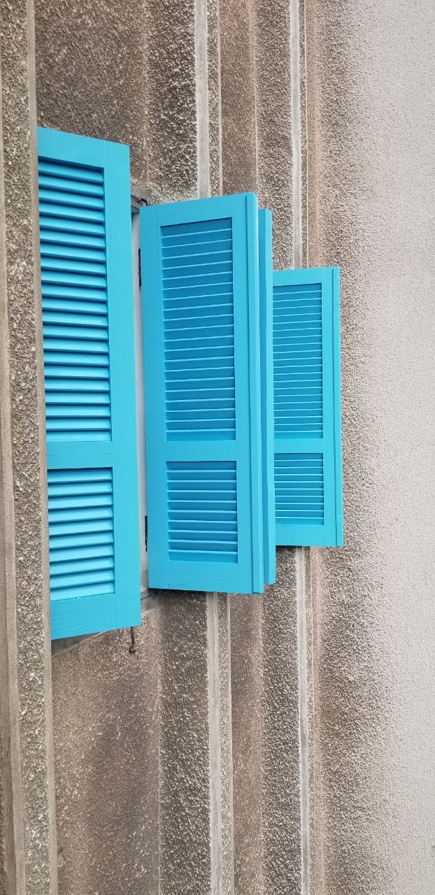 Painted louvre shutters installation
